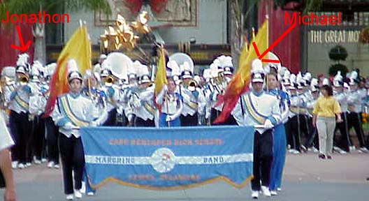 The band at the other end of the street.  This was when I knew for sure that Jonathon was marching, and when I started blubbering like a Mom